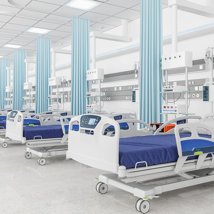 Empty beds in a hospital ward